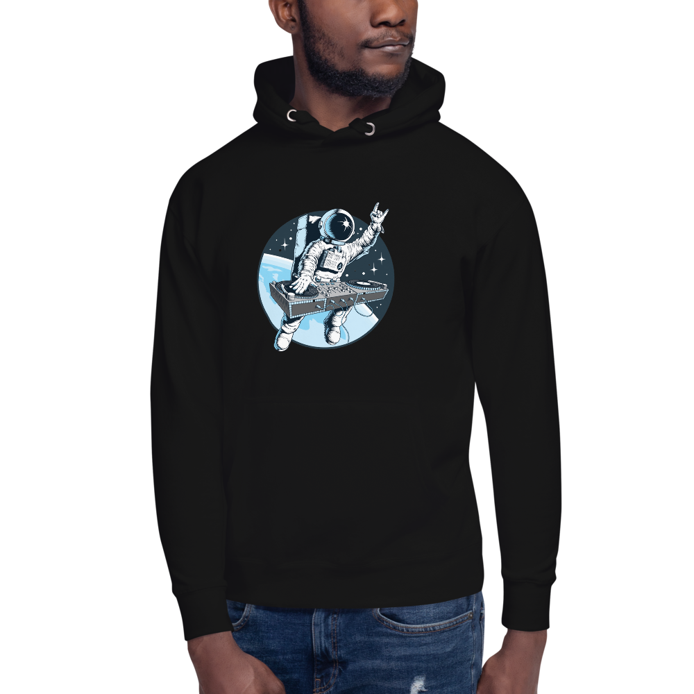 Man wears black hoodie with front pouch pocket and astronaut djing on cdjs front print